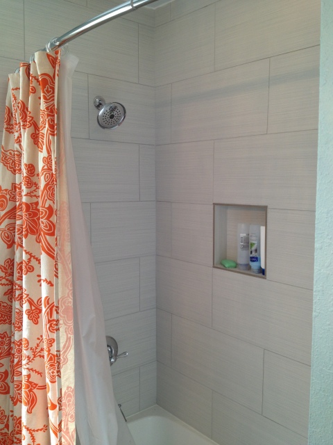 I really like that orange shower curtain!